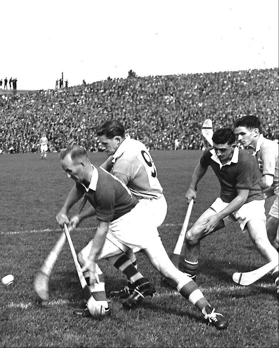 MAN AND BALL: Christy Ring in the heat of battle against Dublin in the 1952 All Ireland final at Croke Park. MAN AND BALL: Christy Ring in the heat of battle against Dublin in the 1952 All Ireland final at Croke Park.