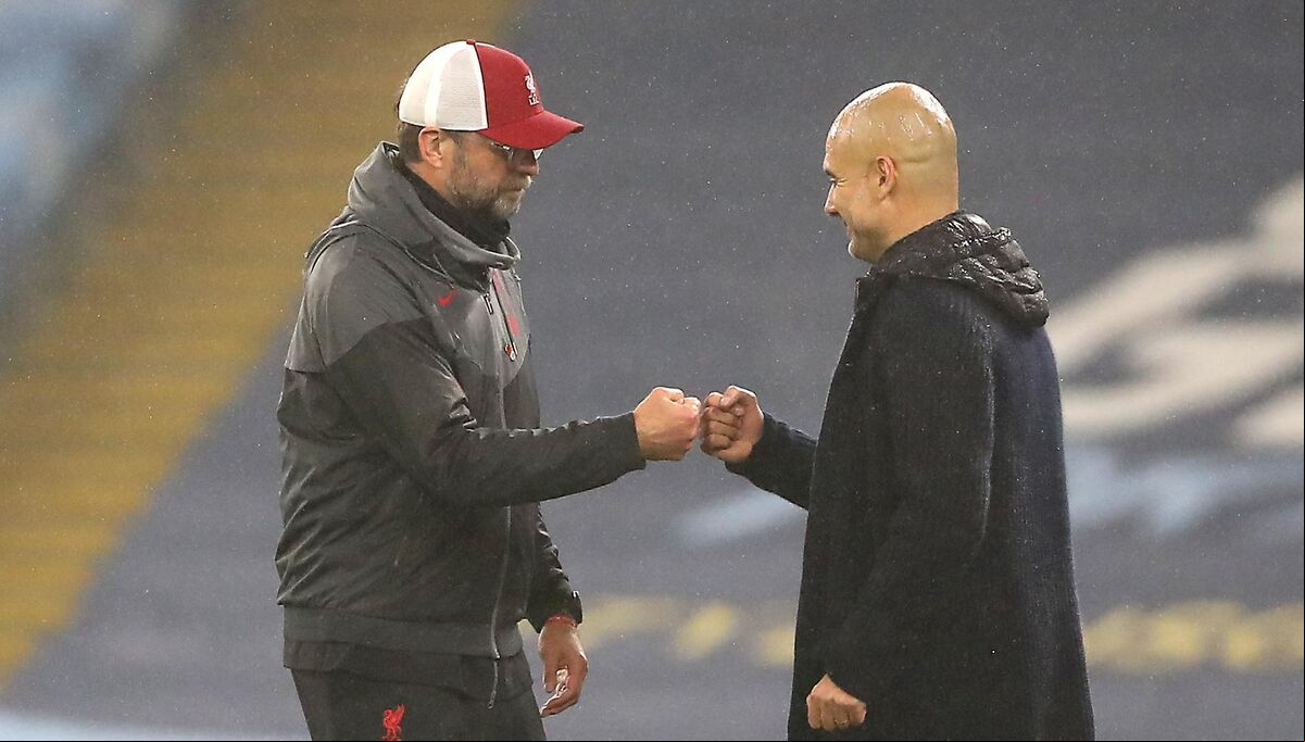 Jurgen Klopp and Pep Guardiola. Picture: Martin Rickett/PA Wire Jurgen Klopp and Pep Guardiola. Picture: Martin Rickett/PA Wire