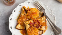 crepes suzette, delicious pancakes with orange sauce, square image