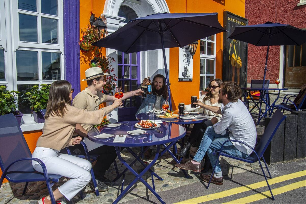 Cara Ryan, Brian O'Connor, Josh Cotter, Zoe Greenway & Kit French celebrating the return of outdoor dining at The Bulman in Kinsale. Pic: Becca Geden. Cara Ryan, Brian O'Connor, Josh Cotter, Zoe Greenway & Kit French celebrating the return of outdoor dining at The Bulman in Kinsale. Pic: Becca Geden.