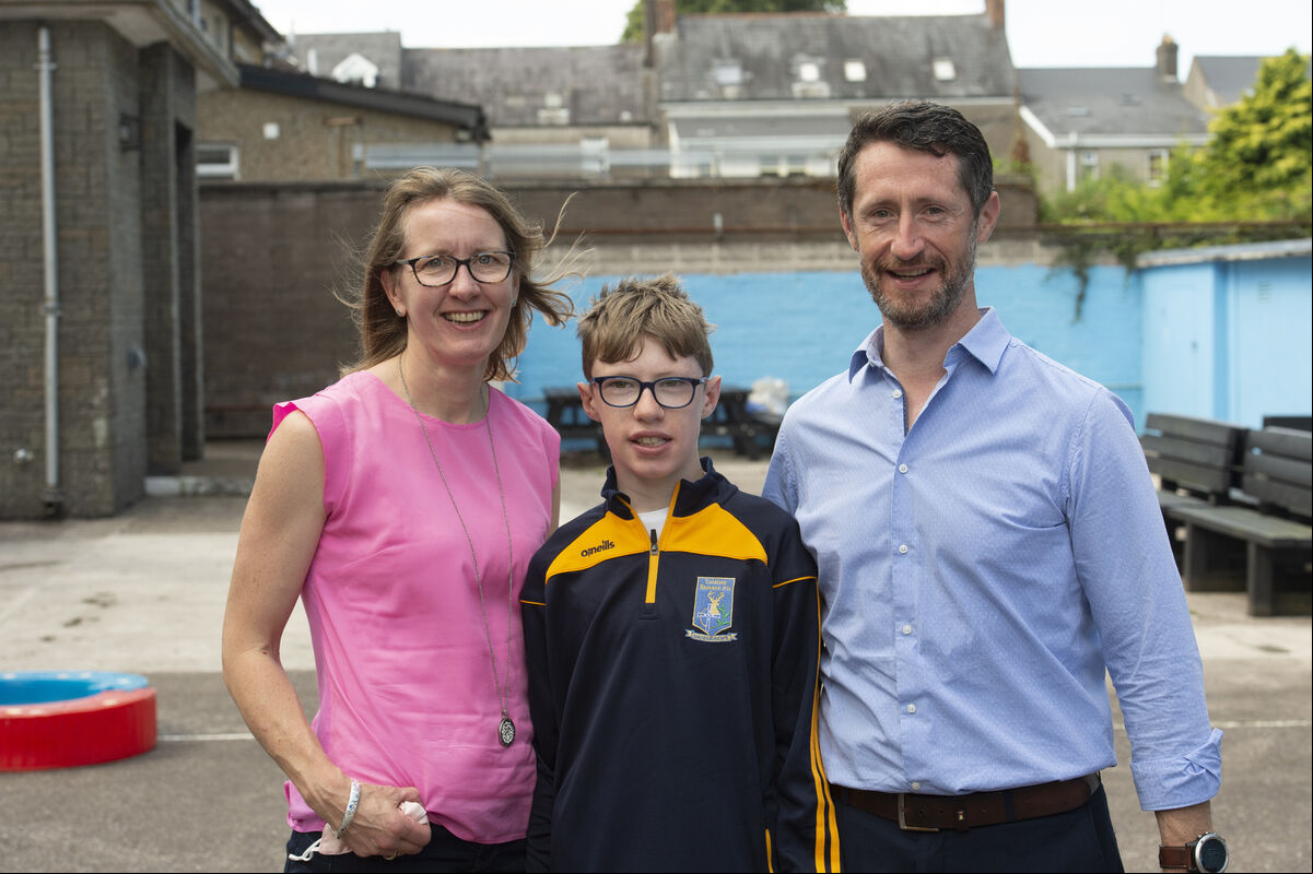 Ciarán kelleher with his parents Trish and Derry at the introductory day for pupils at Coláiste Éamann Rís, Cork. Picture Dan Linehan Ciarán kelleher with his parents Trish and Derry at the introductory day for pupils at Coláiste Éamann Rís, Cork. Picture Dan Linehan