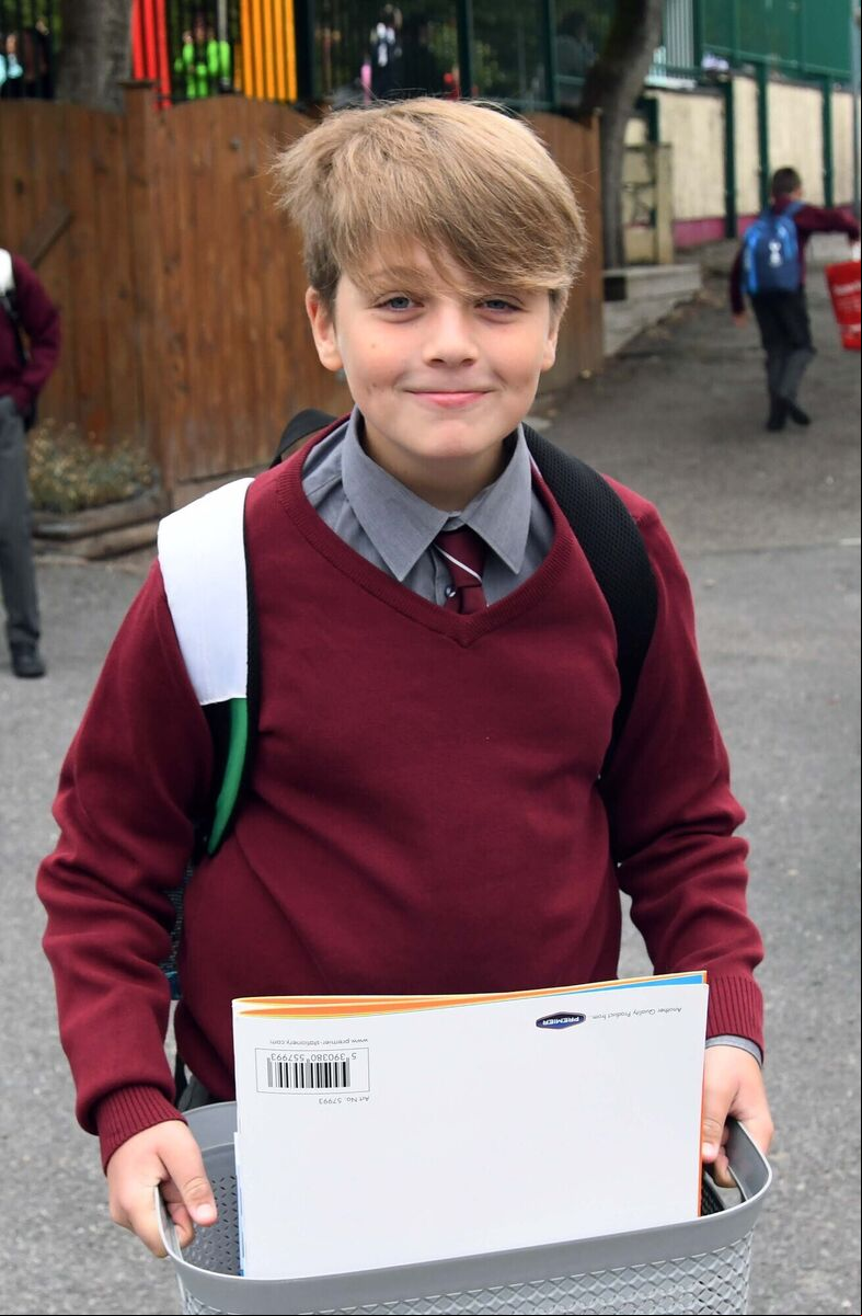 Ben Mulcahy, sixth class, arriving on the opening day of the new co-educational Strawberry Hill N.S., Cork. Picture Denis Minihane. Ben Mulcahy, sixth class, arriving on the opening day of the new co-educational Strawberry Hill N.S., Cork. Picture Denis Minihane.