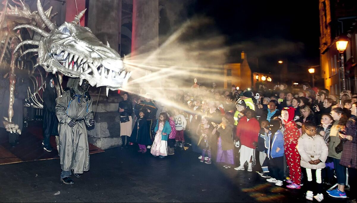 311014 The Dragon of Shandon Festival, Shandon Cork. The Finale of the Dragon of Shandon Festival in Cork City as the Dragon exits the Butter Exchange. Photo Andy Jay. 311014 The Dragon of Shandon Festival, Shandon Cork. The Finale of the Dragon of Shandon Festival in Cork City as the Dragon exits the Butter Exchange. Photo Andy Jay.