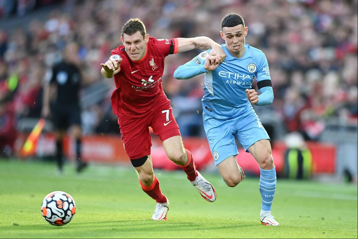 Phil Foden of Manchester City breaks away from James Milner of Liverpool during their Premier League match at Anfield last October. The match ended in a draw. Picture: Michael Regan/Getty Images Phil Foden of Manchester City breaks away from James Milner of Liverpool during their Premier League match at Anfield last October. The match ended in a draw. Picture: Michael Regan/Getty Images