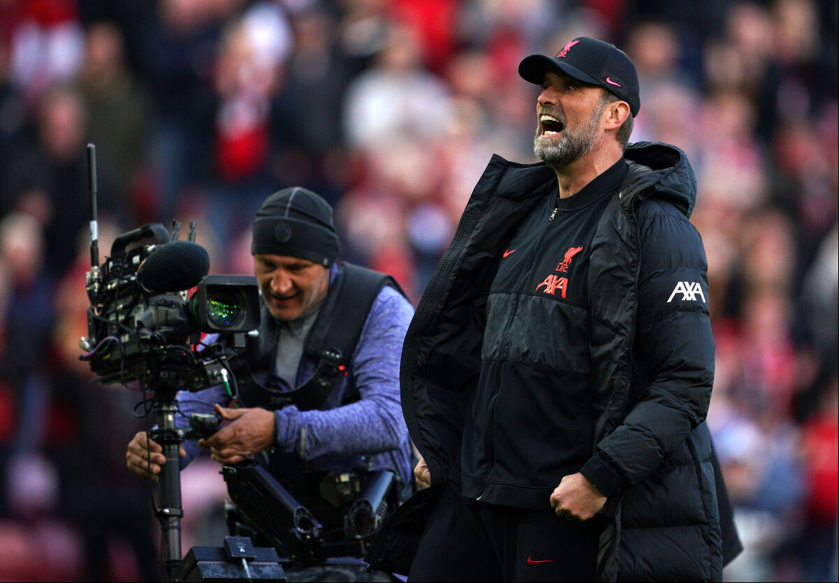 Liverpool manager Jurgen Klopp reacts with the fans on the Kop at Anfield. To the delight of TV stations covering the game. Picture: Peter Byrne/PA Wire Liverpool manager Jurgen Klopp reacts with the fans on the Kop at Anfield. To the delight of TV stations covering the game. Picture: Peter Byrne/PA Wire