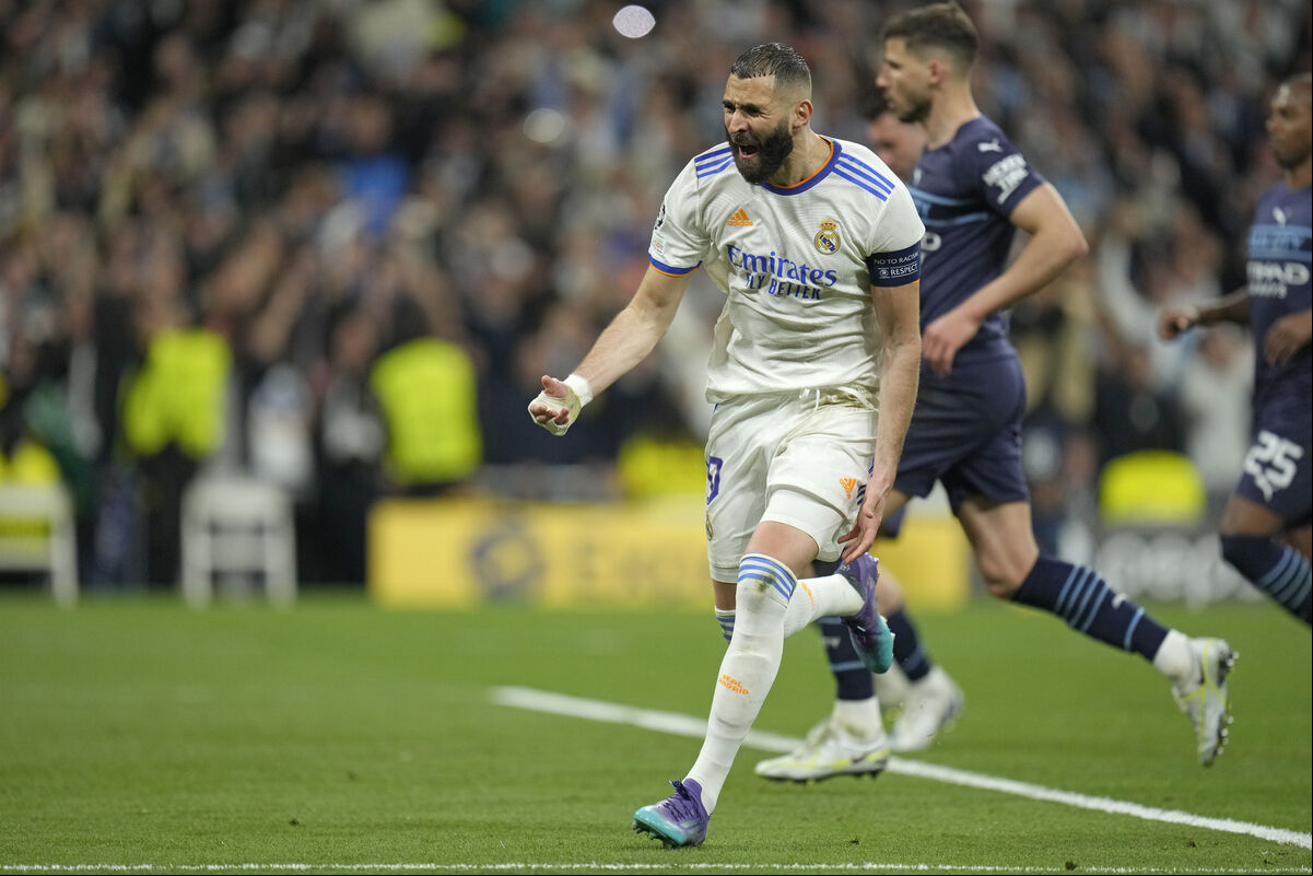 Real Madrid's Karim Benzema celebrates after scoring his side's third goal during the Champions League semi-final, second leg soccer match against Manchester City at the Santiago Bernabeu stadium in Madrid, Spain, Picture: AP Photo/Manu Fernandez Real Madrid's Karim Benzema celebrates after scoring his side's third goal during the Champions League semi-final, second leg soccer match against Manchester City at the Santiago Bernabeu stadium in Madrid, Spain, Picture: AP Photo/Manu Fernandez