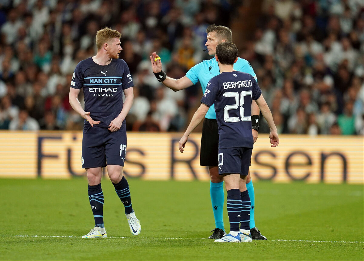 Referee Daniele Orsato speaks with Manchester City's Kevin De Bruyne (left) and Bernardo Silva during the UEFA Champions League semi-final, second leg match at the Santiago Bernabeu, Madrid. Picture: Nick Potts/PA Wire Referee Daniele Orsato speaks with Manchester City's Kevin De Bruyne (left) and Bernardo Silva during the UEFA Champions League semi-final, second leg match at the Santiago Bernabeu, Madrid. Picture: Nick Potts/PA Wire