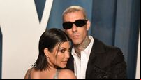 Travis Barker pictured being taken to hospital following medical issue