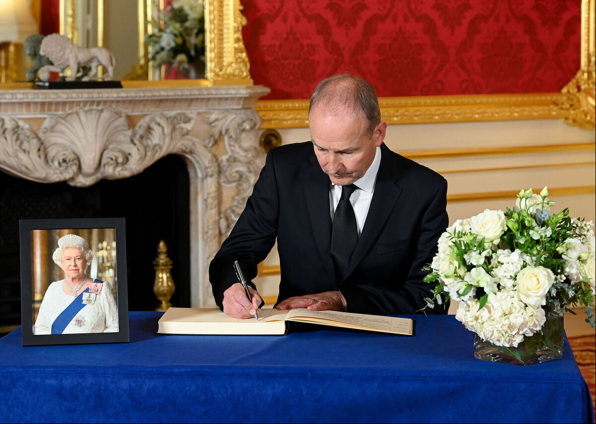 Taoiseach Micheal Martin signs a book of condolence at Lancaster House in London, following the death of Queen Elizabeth II. Photo: Jonathan Hordle/PA Media Assignments Taoiseach Micheal Martin signs a book of condolence at Lancaster House in London, following the death of Queen Elizabeth II. Photo: Jonathan Hordle/PA Media Assignments