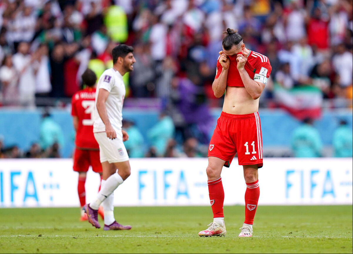 Wales' Gareth Bale appears dejected during the FIFA World Cup Group B match against Iran at the Ahmad Bin Ali Stadium, Al-Rayyan. Picture: Adam Davy/PA Wire. Wales' Gareth Bale appears dejected during the FIFA World Cup Group B match against Iran at the Ahmad Bin Ali Stadium, Al-Rayyan. Picture: Adam Davy/PA Wire.