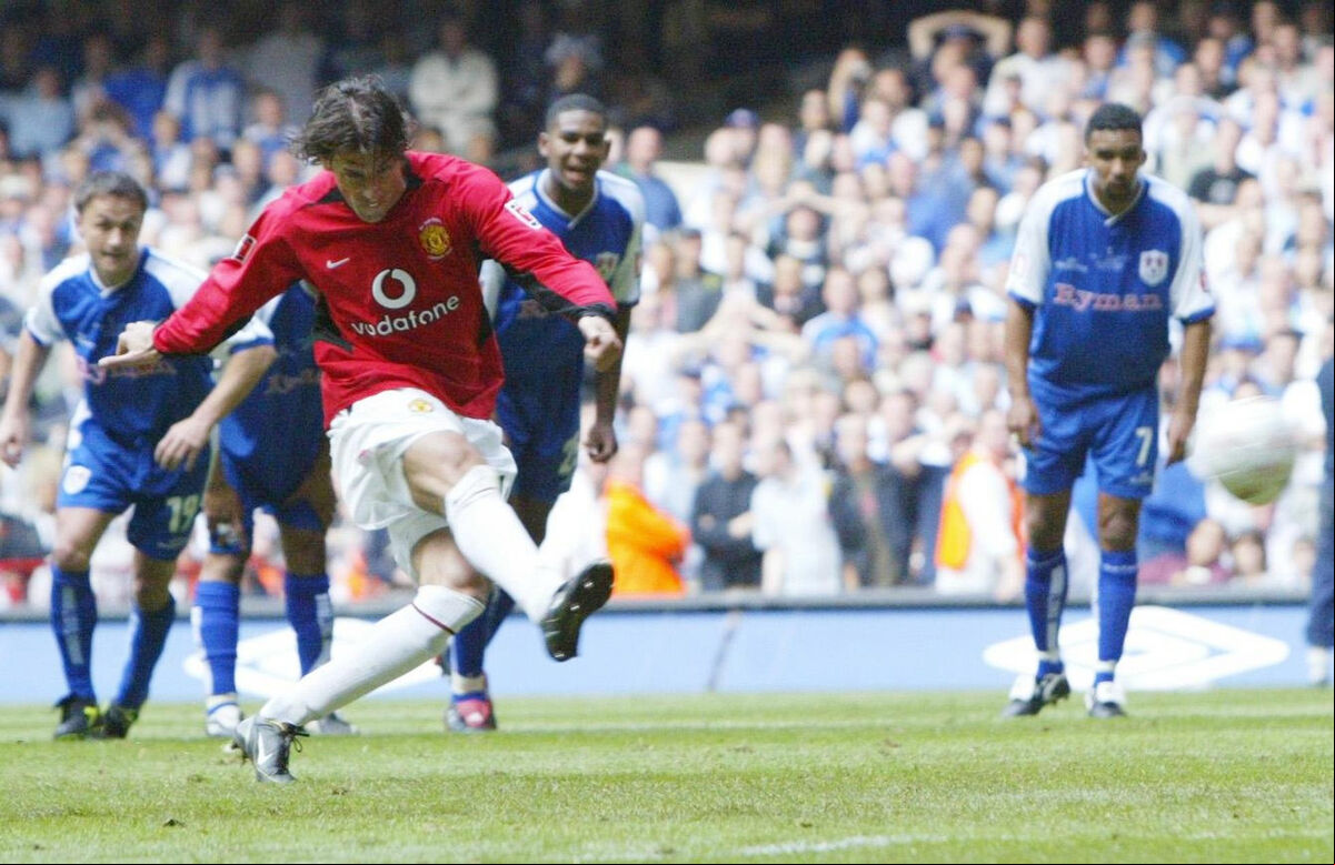 Manchester United's Ruud van Nistelrooy scores his side's second goal, from the penalty spot, against Millwall during the FA Cup Final at the Millennium Stadium, Cardiff, May 22 2004. Picture: Martin Rickett Manchester United's Ruud van Nistelrooy scores his side's second goal, from the penalty spot, against Millwall during the FA Cup Final at the Millennium Stadium, Cardiff, May 22 2004. Picture: Martin Rickett