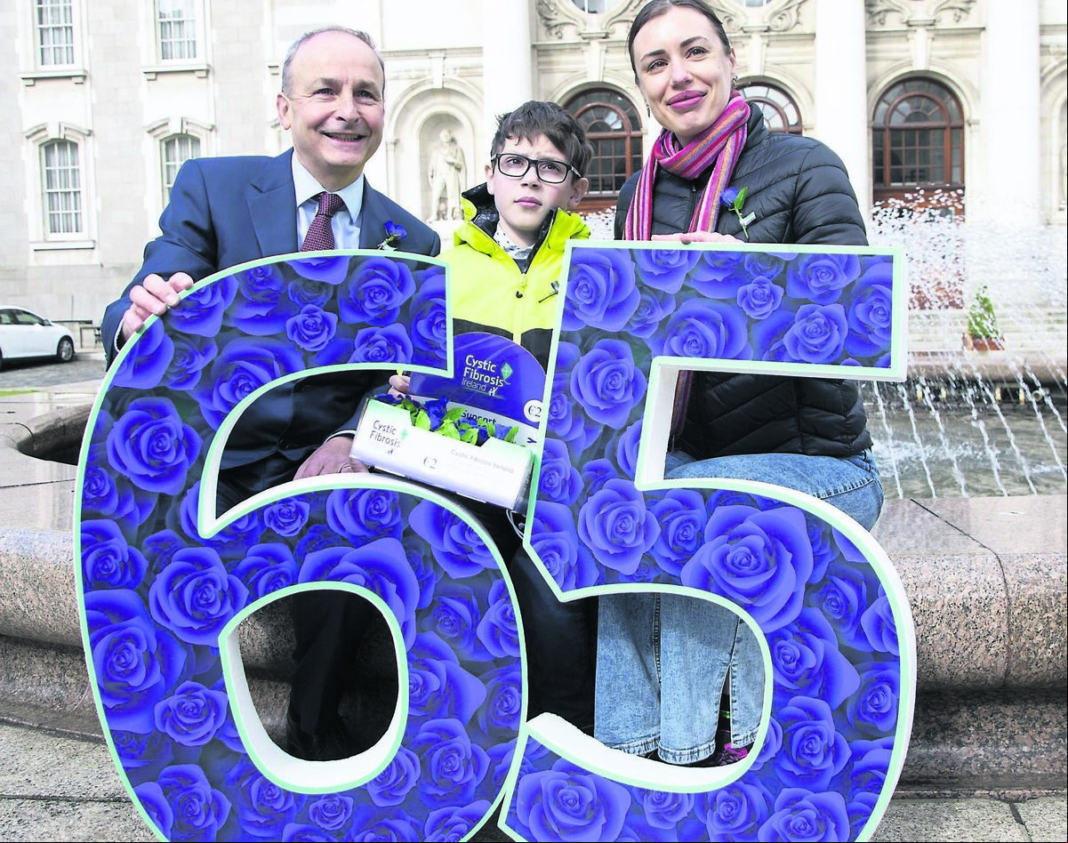 Then Taoiseach Micheál Martin launches last year’s 65 Roses campaign for Cystic Fibrosis with Anastasiia Tkachuk and her son Tymofii, aged nine, a person with cystic fibrosis, who both fled the war in Ukraine Then Taoiseach Micheál Martin launches last year’s 65 Roses campaign for Cystic Fibrosis with Anastasiia Tkachuk and her son Tymofii, aged nine, a person with cystic fibrosis, who both fled the war in Ukraine