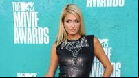 Paris Hilton shares pictures of newborn son
