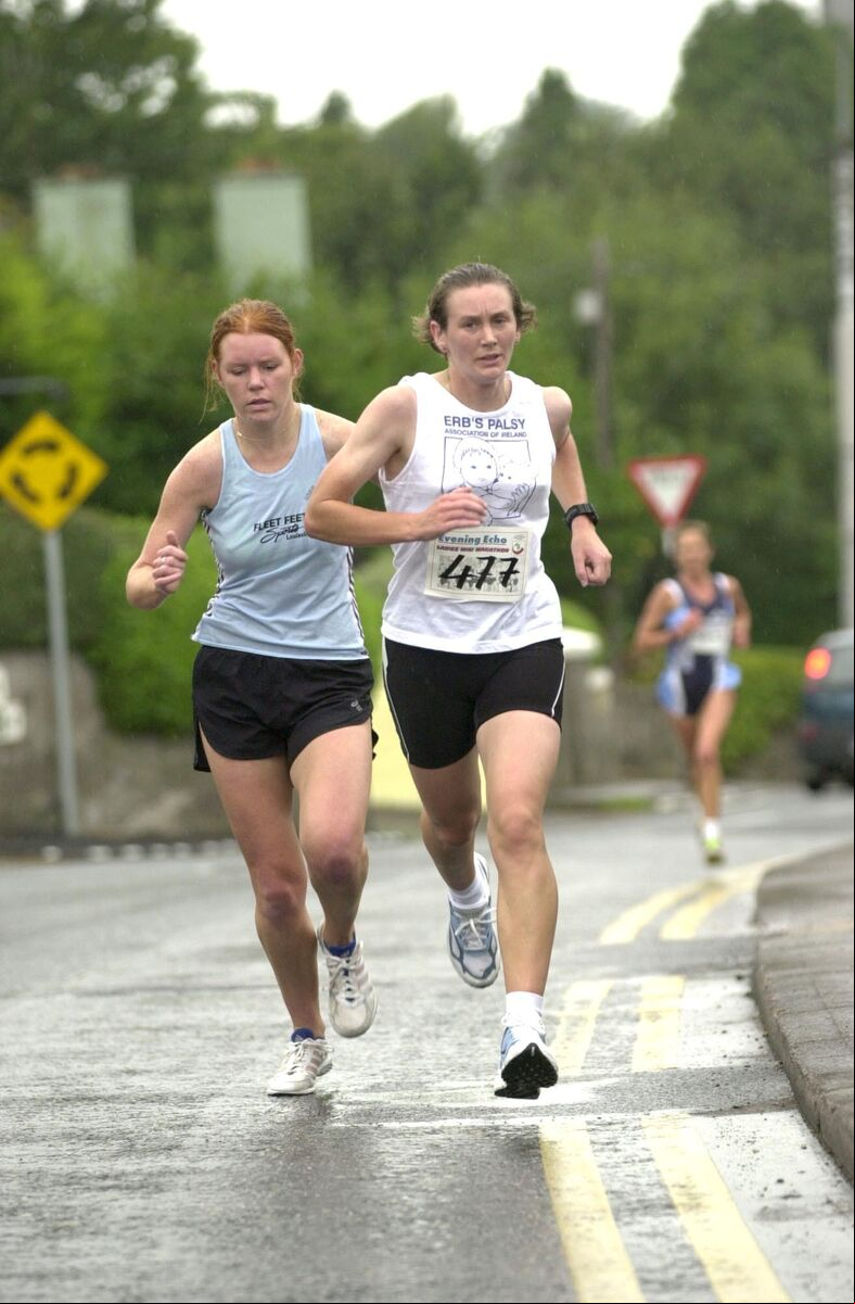 Olga Cronin and Collette O'Riordan (right) battling in the 2003 Evening Echo Ladies Mini Marathon. Picture: Brian Lougheed