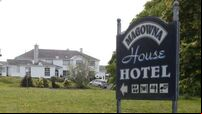 Tánaiste criticises road blockade near former hotel housing asylum seekers in Clare