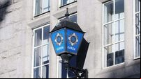 Cash box stolen after security guard threatened with fake gun