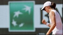 French Open day five: Iga Swiatek eases through as Daniel Altmaier shocks Sinner