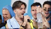 Jack Grealish revels as Manchester City parade treble