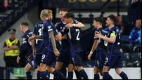 Scotland beat Georgia – and the weather – to move eight points clear in Group A