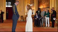 Derek Draper watches as wife Kate Garraway collects MBE from William