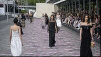 Paris Fashion Week continues to draw stars in riot-hit 