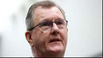 Donaldson says he will not ‘bow to threats’ amid warning of loyalist protests