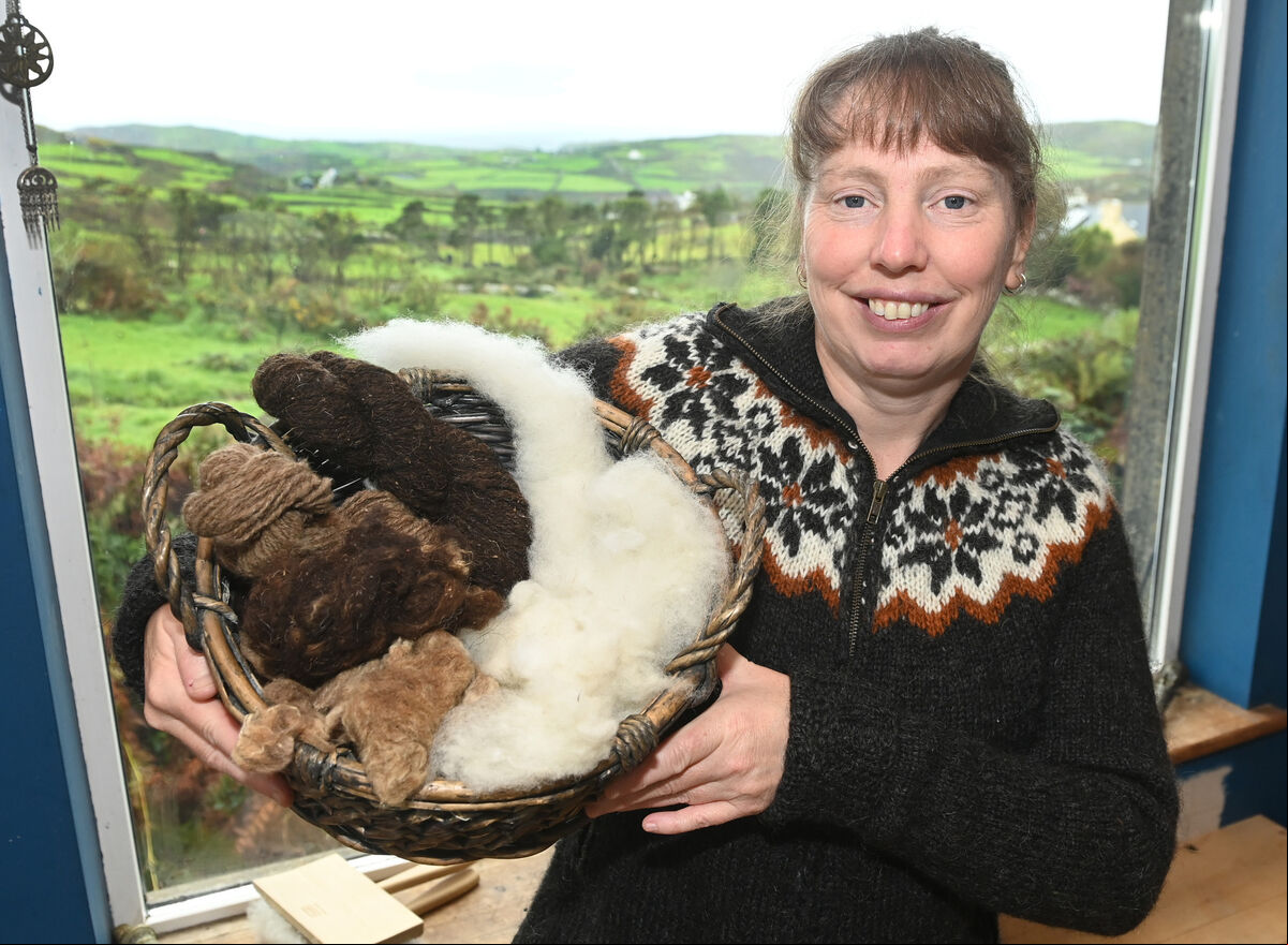 Kirsty Affleck, with a selection of wool from her sheep at home in Cape Clear. Picture; Eddie O'Hare Kirsty Affleck, with a selection of wool from her sheep at home in Cape Clear. Picture; Eddie O'Hare