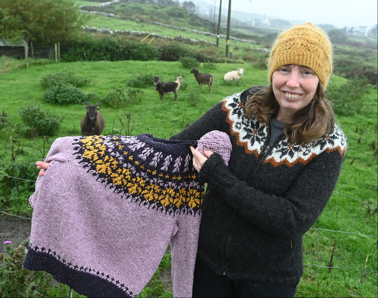 Kirsty Affleck,with her sheep and some of her work on Cape Clear . Picture; Eddie O'Hare Kirsty Affleck,with her sheep and some of her work on Cape Clear . Picture; Eddie O'Hare