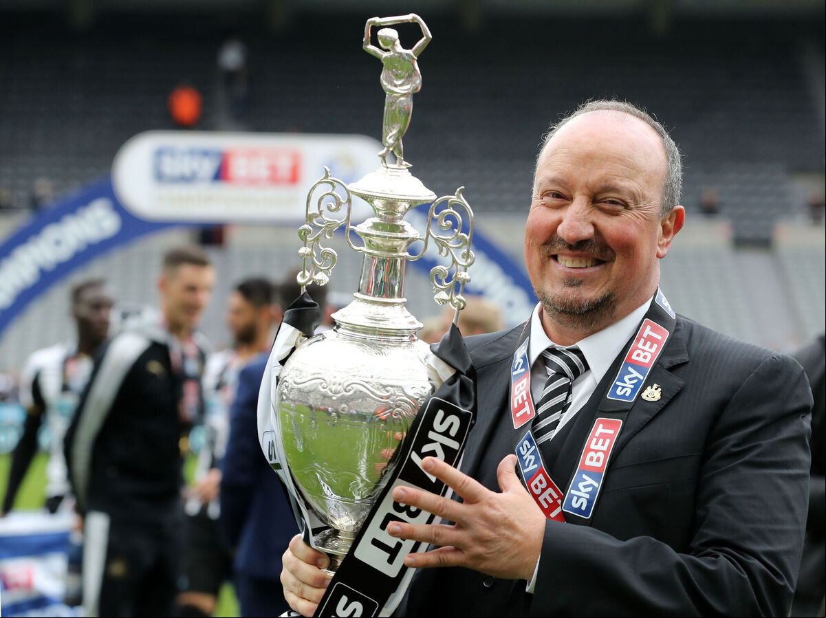 Newcastle United manager Rafa Benitez celebrates with the Sky Bet Championship. trophy in 2017 Picture: Owen Humphreys/PA Wire. Newcastle United manager Rafa Benitez celebrates with the Sky Bet Championship. trophy in 2017 Picture: Owen Humphreys/PA Wire.