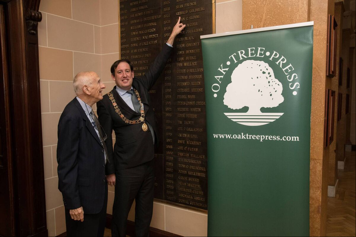 David Goldberg and Cllr Kieran McCarthy, Lord Mayor of Cork City, pointing out David’s father’s name on the list of Lords Mayor at the launch of his book, ‘Gerald & Sheila Goldberg of Cork: A Son’s Perspective’. Picture: Rob Lamb David Goldberg and Cllr Kieran McCarthy, Lord Mayor of Cork City, pointing out David’s father’s name on the list of Lords Mayor at the launch of his book, ‘Gerald & Sheila Goldberg of Cork: A Son’s Perspective’. Picture: Rob Lamb