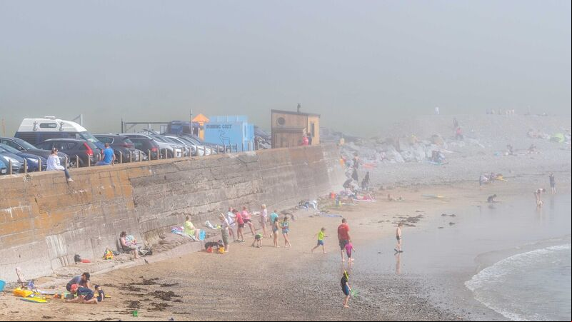 Family dramatically rescued by surfers after getting into trouble at Cork beach Family dramatically rescued by surfers after getting into trouble at Cork beach