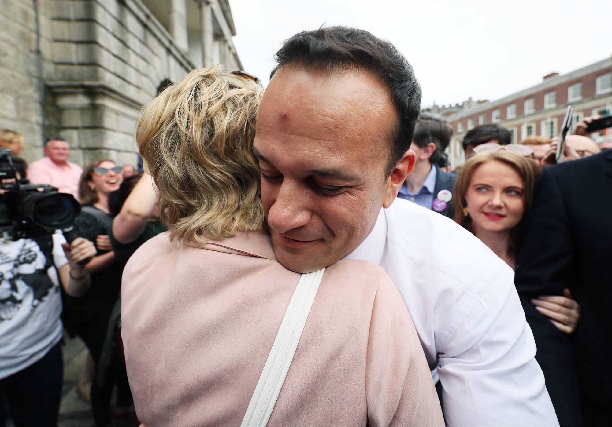 An Taoiseach Leo Varadkar embraces Senator Ivana Bacik on arrival at Dublin Castle for the results of the referendum on the 8th Amendment of the Irish Constitution which prohibits abortions unless a mother's life is in danger. Picture date: Saturday May 26, 2018.