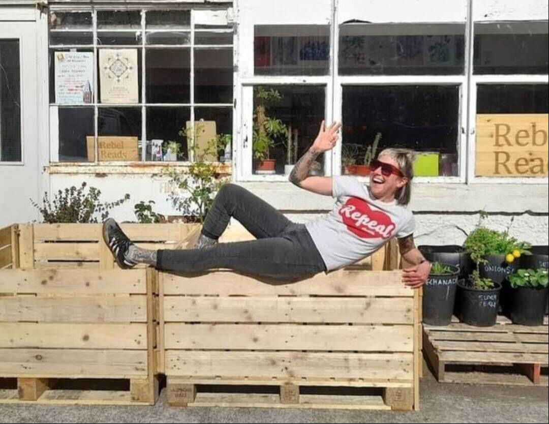 Virginia O'Gara on raised bed. Virginia O'Gara on raised bed.