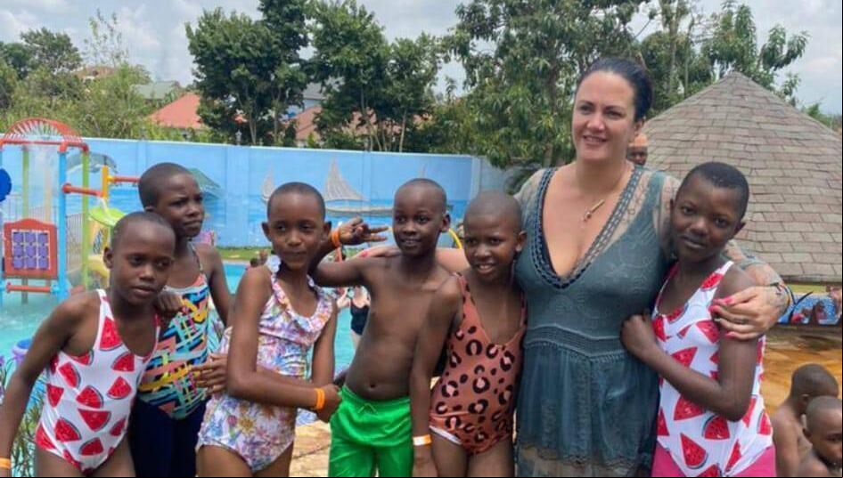 Lenore with some of the children she is helping to through The Teretta Foundation. Lenore with some of the children she is helping to through The Teretta Foundation.