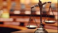 Woman takes action against former solicitor over alleged refusal to return property deeds