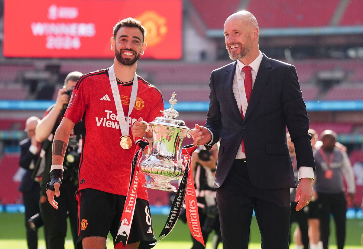 Manchester United's Bruno Fernandes and manager Erik ten Hag with the FA Cup Trophy at Wembley Stadium, London. Picture: John Walton/PA Wire Manchester United's Bruno Fernandes and manager Erik ten Hag with the FA Cup Trophy at Wembley Stadium, London. Picture: John Walton/PA Wire
