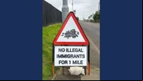 Police remove anti-immigration sign from Co Tyrone village