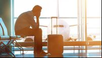 enger waits for plane in an airport