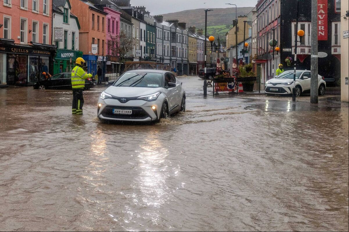 Council workers and the fire service were out in force trying to stem the flood waters in Bantry on Saturday. Picture: Andy GIbson. Council workers and the fire service were out in force trying to stem the flood waters in Bantry on Saturday. Picture: Andy GIbson.