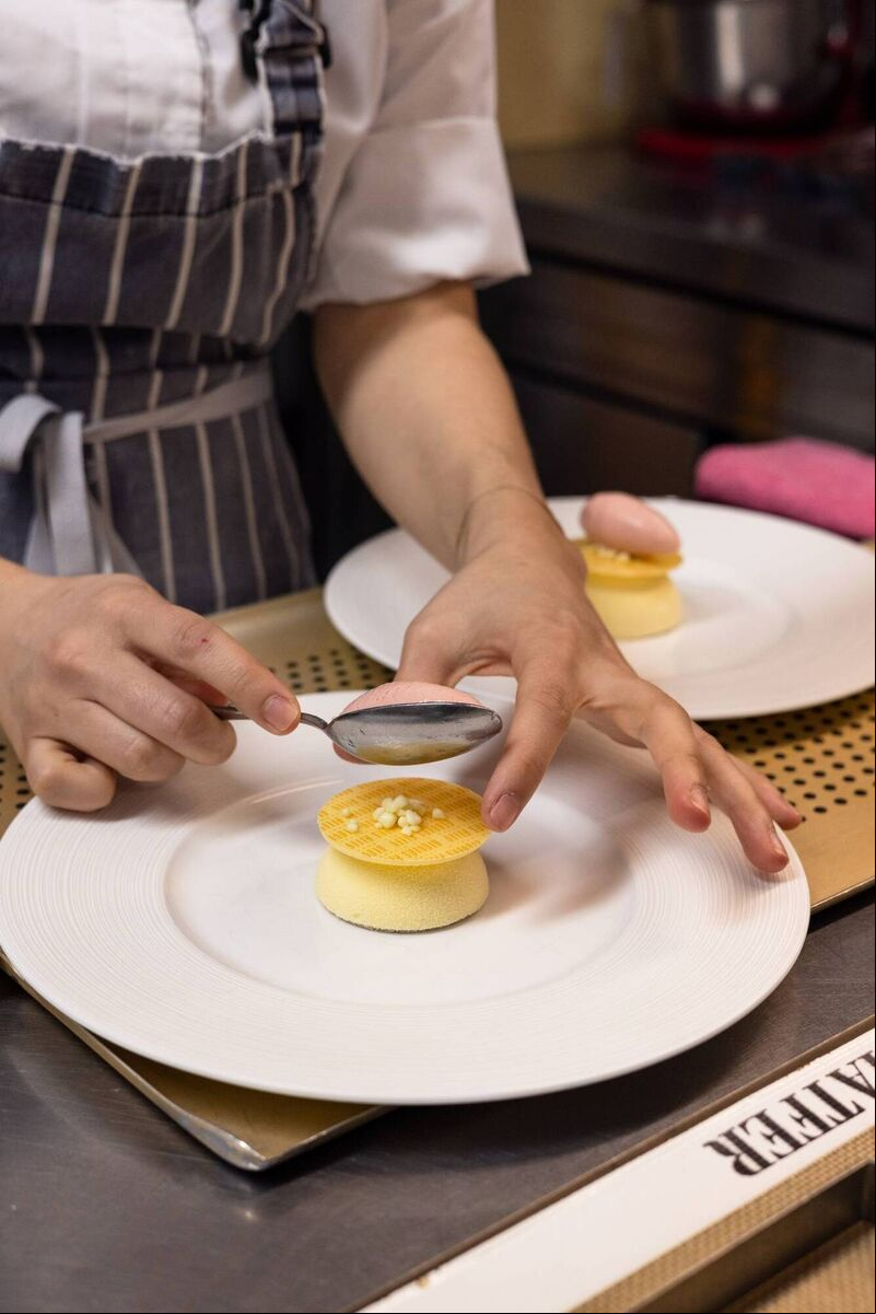 A chef prepares a plate. Picture: Lorna Caulfield) A chef prepares a plate. Picture: Lorna Caulfield)