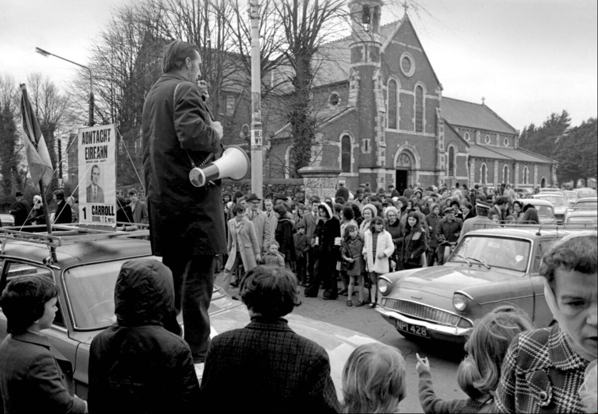 General Election candidate Gerard Carroll campaigning outside Cork churches 18/2/1973 General Election candidate Gerard Carroll campaigning outside Cork churches 18/2/1973