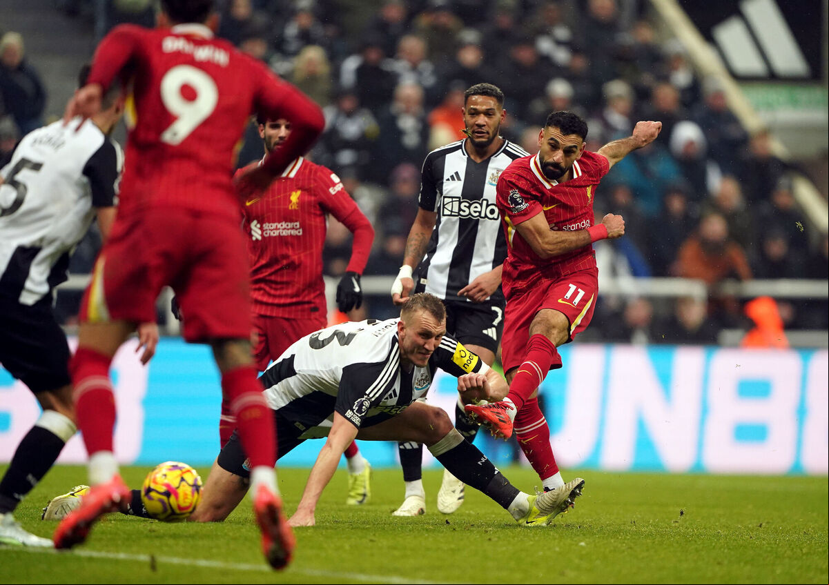 Liverpool's Mohamed Salah scores the side's third goal of the game during the Premier League match at St James' Park, Newcastle Picture: Owen Humphreys/PA Wire. Liverpool's Mohamed Salah scores the side's third goal of the game during the Premier League match at St James' Park, Newcastle Picture: Owen Humphreys/PA Wire.