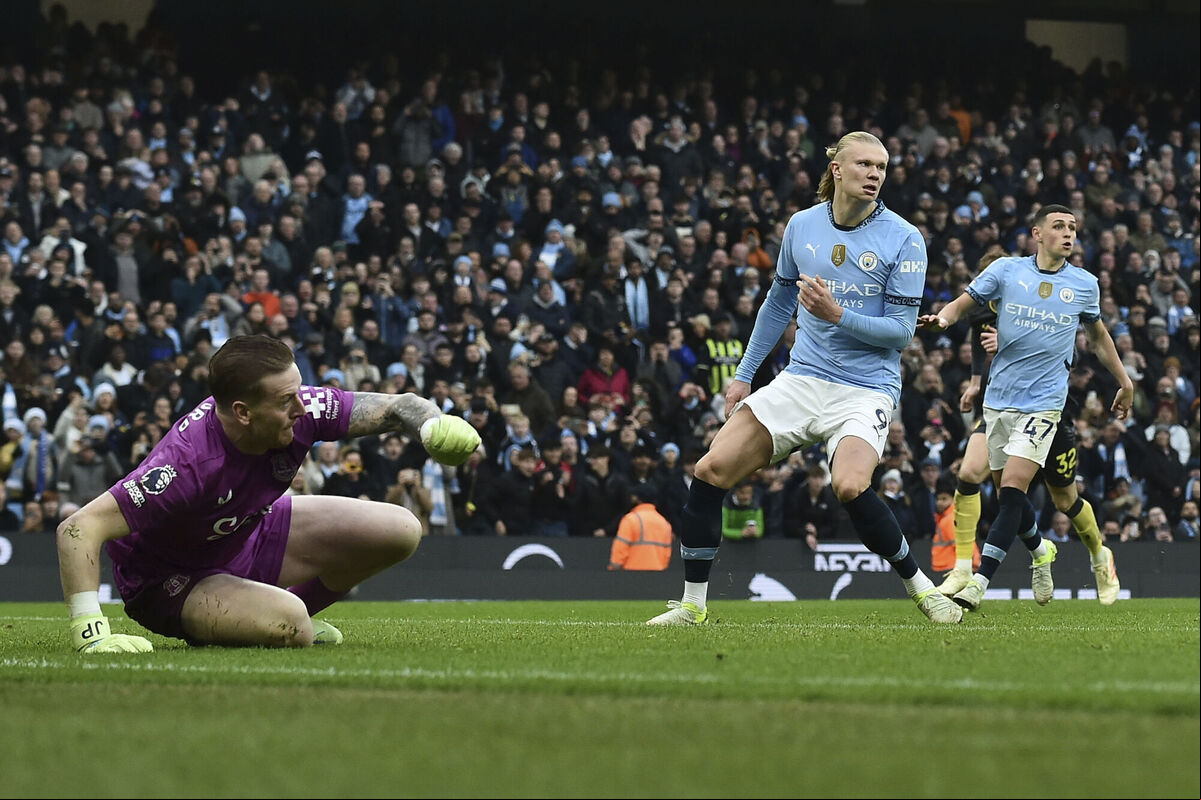 Manchester City's Erling Haaland, centre, reacts after failing to score a penalty kick against Everton's Jordan Pickford during their Premier League match at the Etihad stadium in Manchester on Thursday. Picture: AP Photo/Rui Vieira Manchester City's Erling Haaland, centre, reacts after failing to score a penalty kick against Everton's Jordan Pickford during their Premier League match at the Etihad stadium in Manchester on Thursday. Picture: AP Photo/Rui Vieira