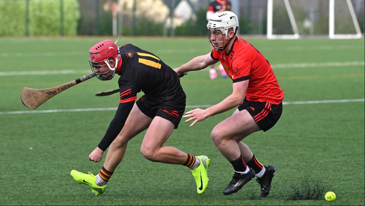 Eoghan O'Shea, CBC, Cork looking to pick up the sliotar under pressure from Niall McNamara, John The Baptist Community School. Picture: Dan Linehan Eoghan O'Shea, CBC, Cork looking to pick up the sliotar under pressure from Niall McNamara, John The Baptist Community School. Picture: Dan Linehan