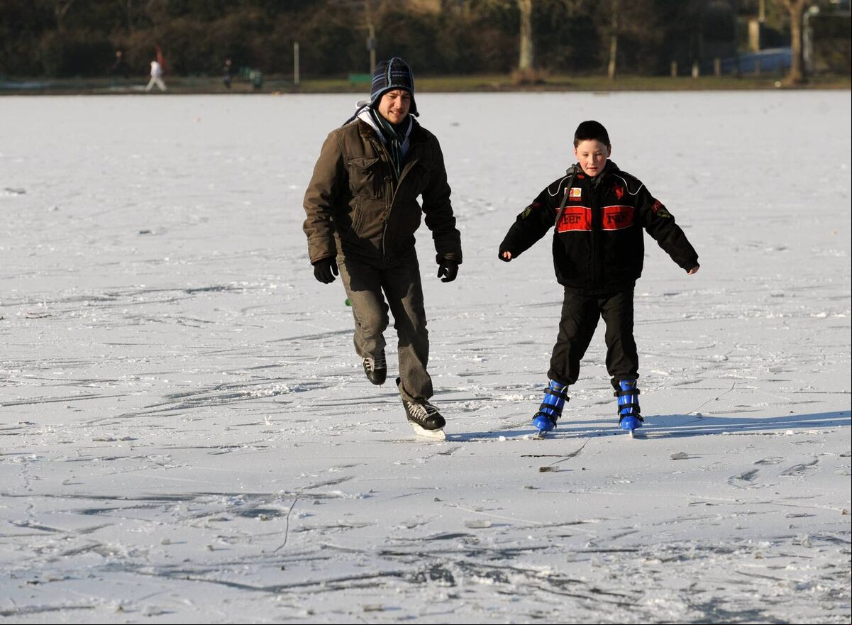 Locals Cian and Tadhg O’Mahony skating on the frozen surface of The Lough during the big freeze of 2010. Picture: Eddie O'Hare Locals Cian and Tadhg O’Mahony skating on the frozen surface of The Lough during the big freeze of 2010. Picture: Eddie O'Hare