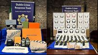 Gardaí seize Gucci goods and 180 counterfeit Apple headphones in Dublin searches