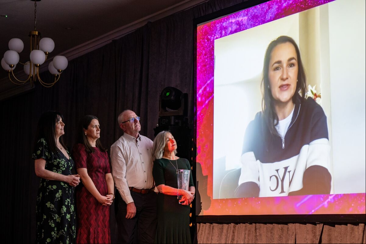 Gráinne McGuinness, The Echo editor, Karen O’Donoghue, managing director, onstage with Phil and Gerry Healy while Their daughter Phil Healy gives her acceptance speech by video link at The Echo Women in Sports Awards in the Metropole Hotel. Picture: Chani Anderson Gráinne McGuinness, The Echo editor, Karen O’Donoghue, managing director, onstage with Phil and Gerry Healy while Their daughter Phil Healy gives her acceptance speech by video link at The Echo Women in Sports Awards in the Metropole Hotel. Picture: Chani Anderson