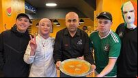 Kneecap visit Cork's Izz Café in between City Hall gigs
