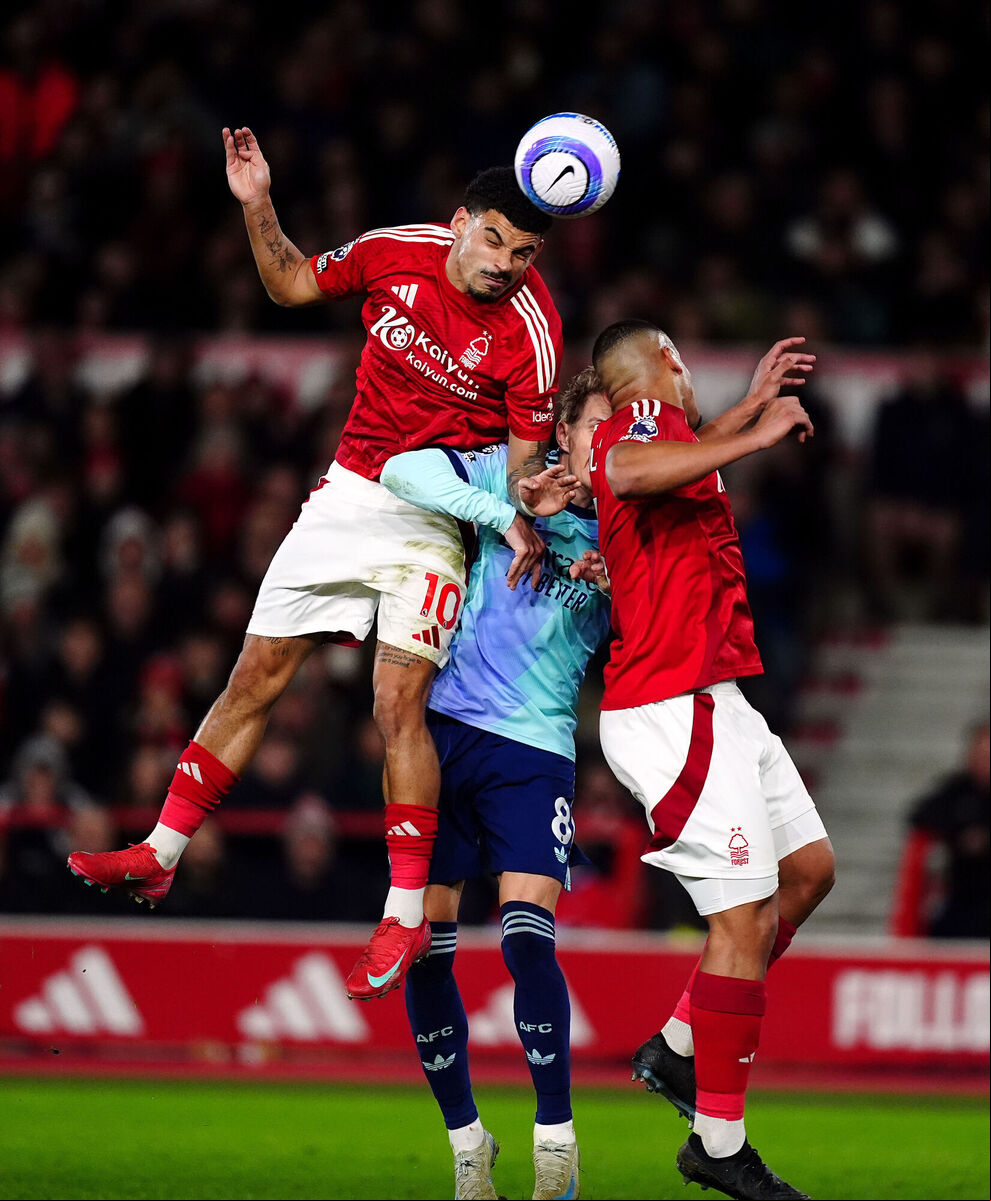 Arsenal's Martin Odegaard is crowded out by Nottingham Forest's Morgan Gibbs-White (left) and Murillo (right) during the Premier League match at the City Ground, Nottingham. Picture: Mike Egerton/PA Wire
