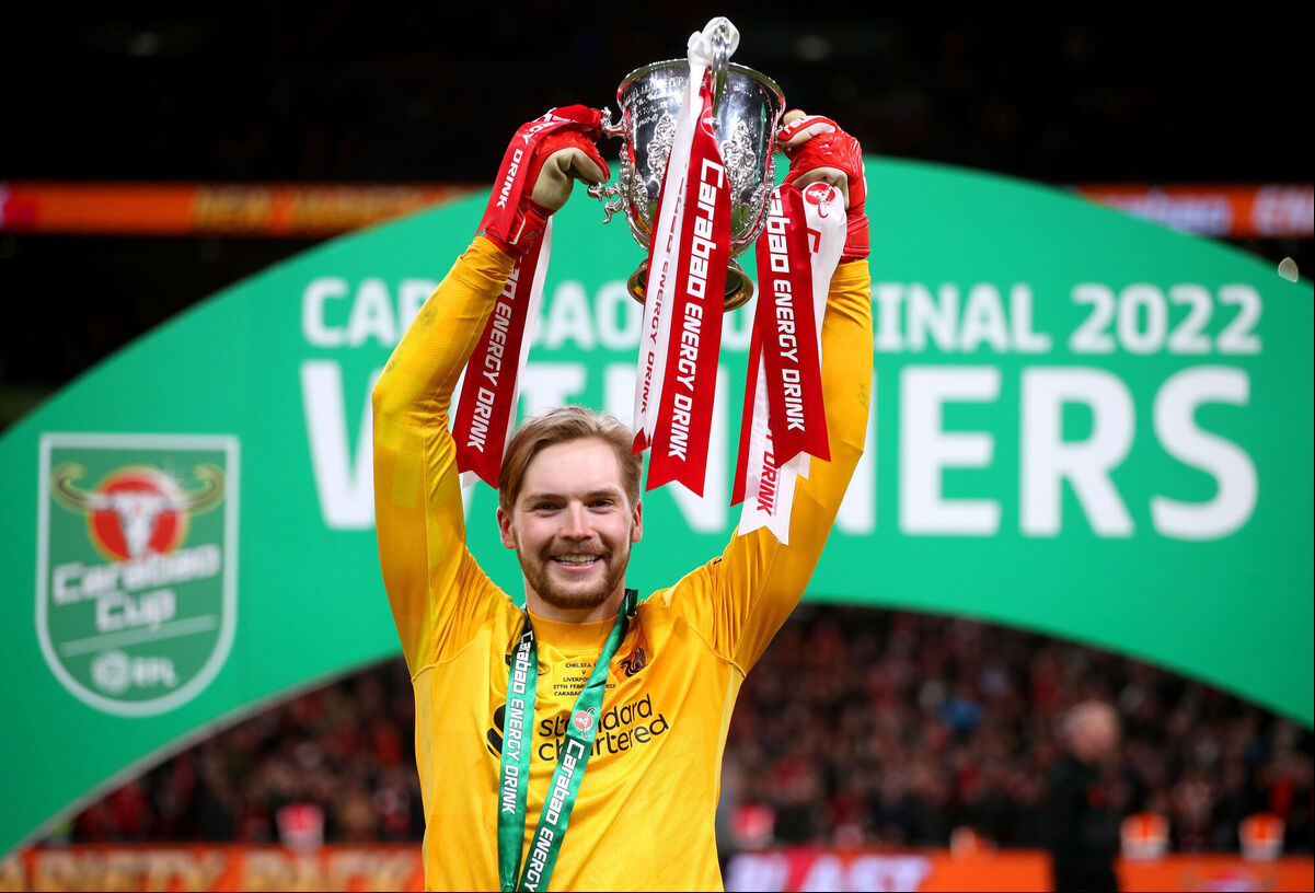 Liverpool's 2022 Carabao Cup final hero Caoimhin Kelleher lifts the trophy. Picture:  Nick Potts/PA Wire